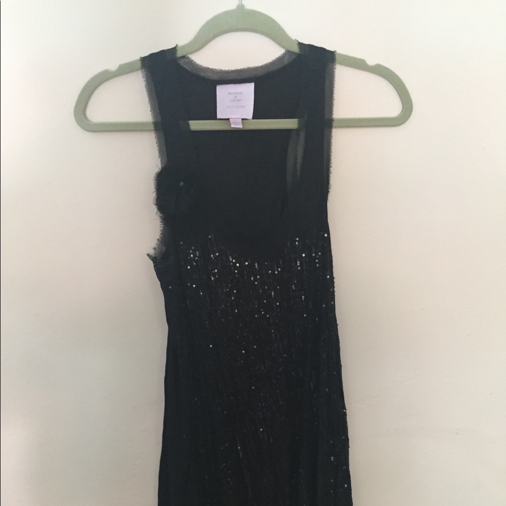 Sequined little black dress